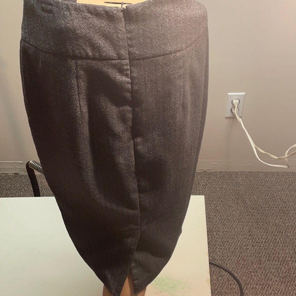 Stretch tweed look skirt made in Vietnam. Size 8